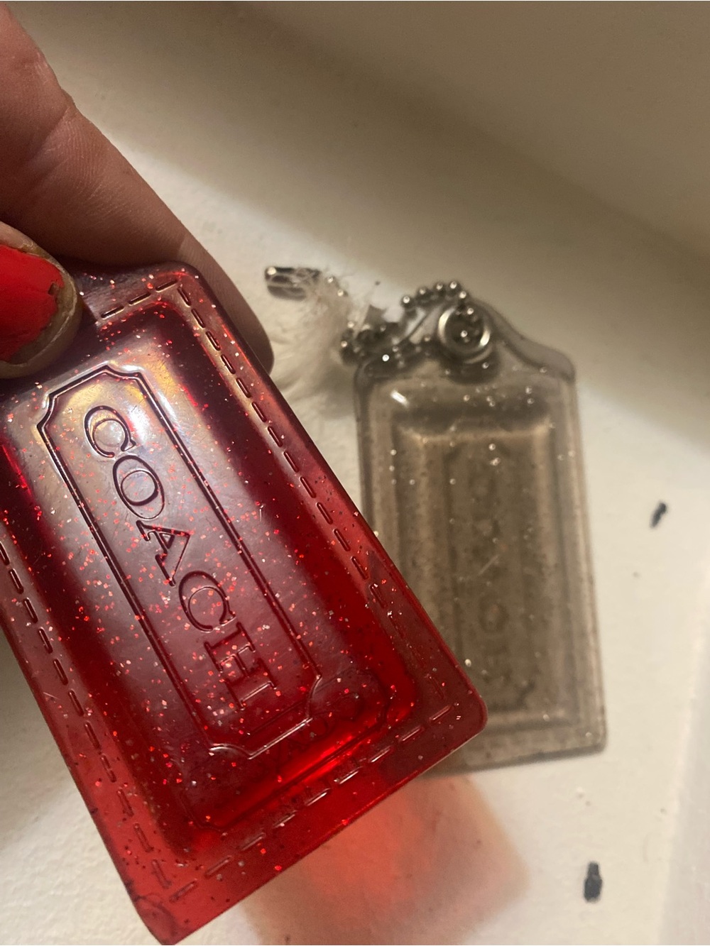 Coach Red and Clear Glitter tag Duo